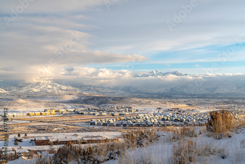 Mountain and residential neighborhood in Utah Valley on a snowy winter day