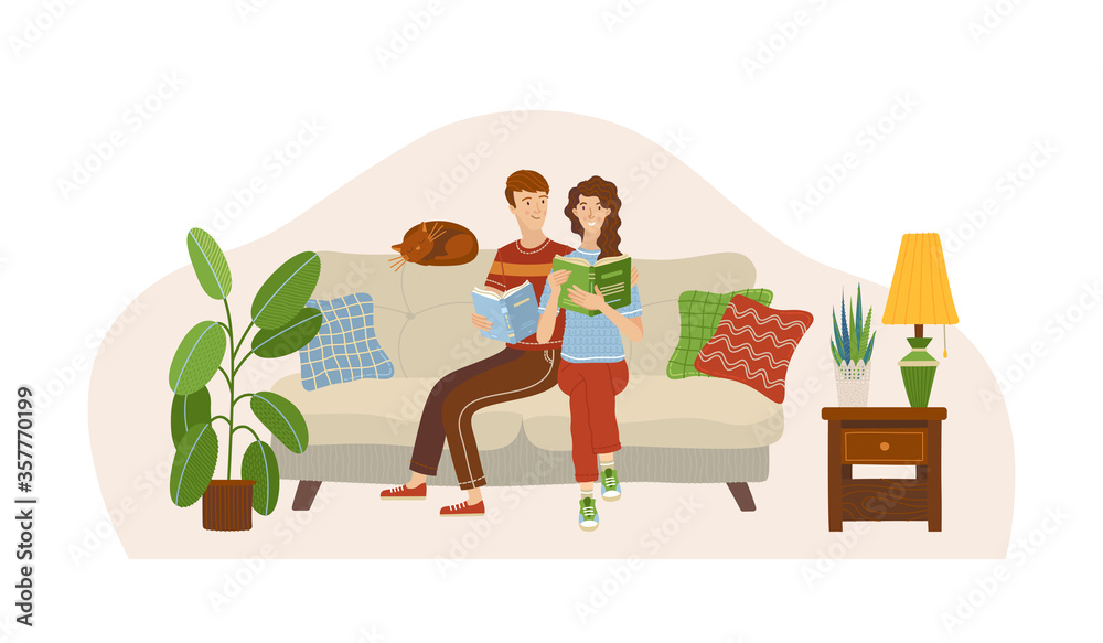Couple in love reading books on sofa