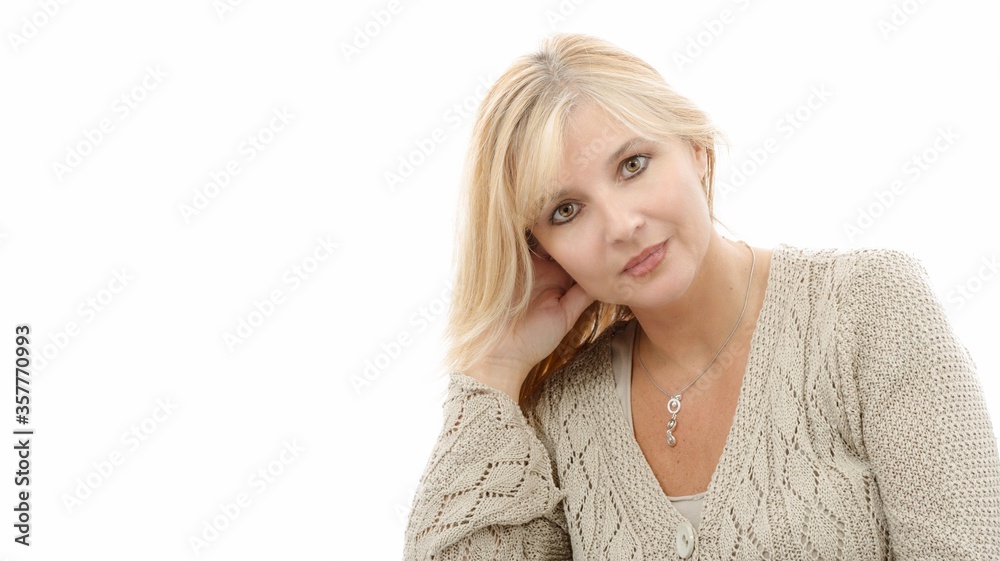 Portrait of mature blond woman on white background Portrait of mature blond woman on white background