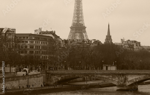 2014-01-12 Paris, France, Europe. Alexander III bridge and Eiffel tower. Monochrome photo. Sepia tone.