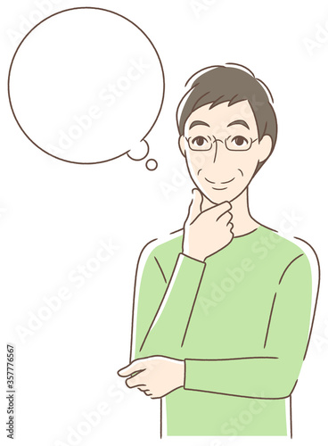 笑顔で想像する男性