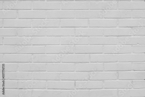White brick wall. Facade of an old building. Architectural background.