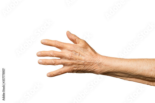 Old senior woman's hand isolated on white background.