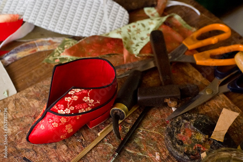 silk shoe for foot binding in a shop of  Malacca, Malaysia photo