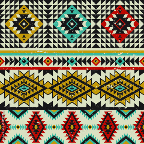 Tribal vector seamless navajo pattern. Aztec abstract geometric art print. Vintage retro colors.Ethnic vector background. Wallpaper, cloth design, fabric, tissue, cover, textile template.