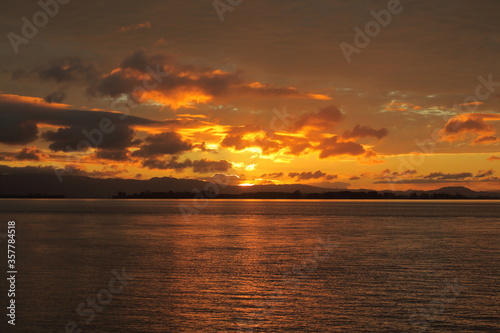 Tauranga New Zealand golden sunsets , sail boat caught in silhouette form © Graham