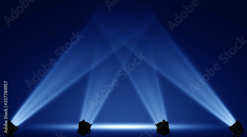 Concert stage with blue spotlight photo