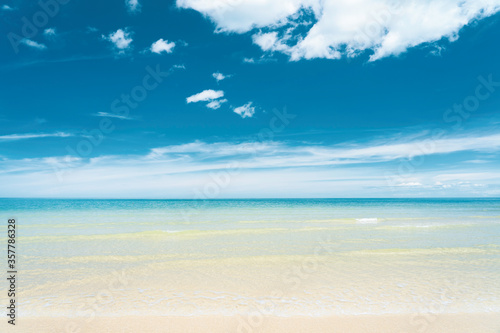 Tropical turquoise colour sea with white sand and blue sky in summer sunny day  Seascape background