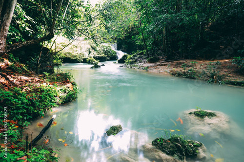 Fototapeta Naklejka Na Ścianę i Meble -  Jamaica,Ocho Rios,19 December 2019: Resort park- Blue hole shack with waterfalls in wild nature  in Jamaica,Ocho Rios. 