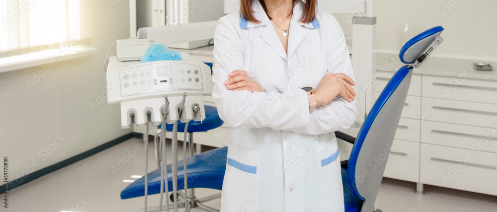 woman dentist doctor in the middle of stomatological medical clinic woman dentist doctor in the middle of stomatological medical clinic