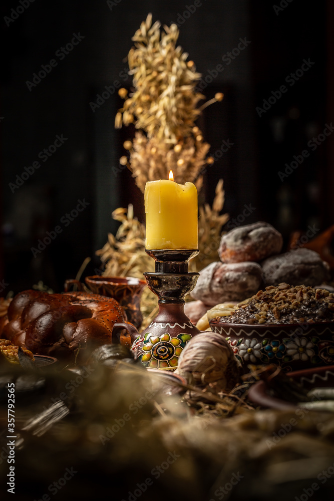 lighted candle, a religious tradition, a symbol of the Christian faith, a wax candle burns with an even flame, blow out a candle, a smoke from an extinguished wick