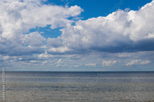clouds over the sea and blue sky