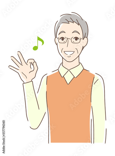 笑顔でOKサインを出す男性