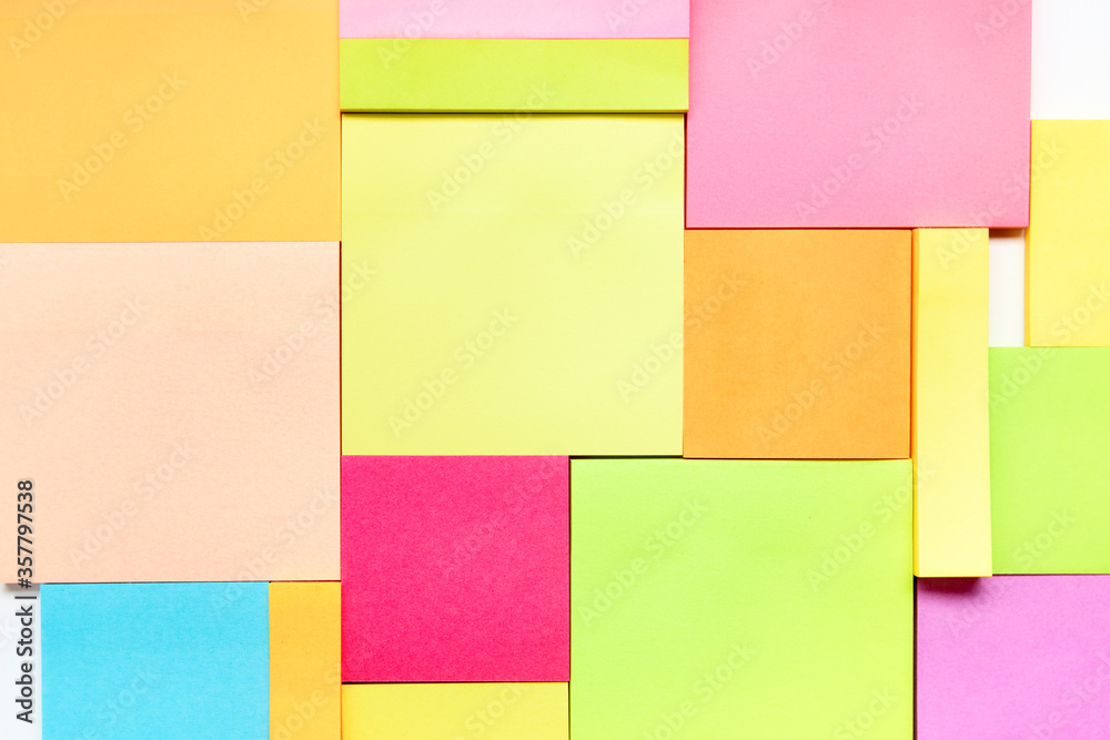 Group of empty coloured post-its as background