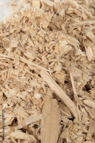 Sawdust. Recycling materials. Office furniture industry. Cradle to cradle. Sustainability. Recycling. Wood materials for reuse.