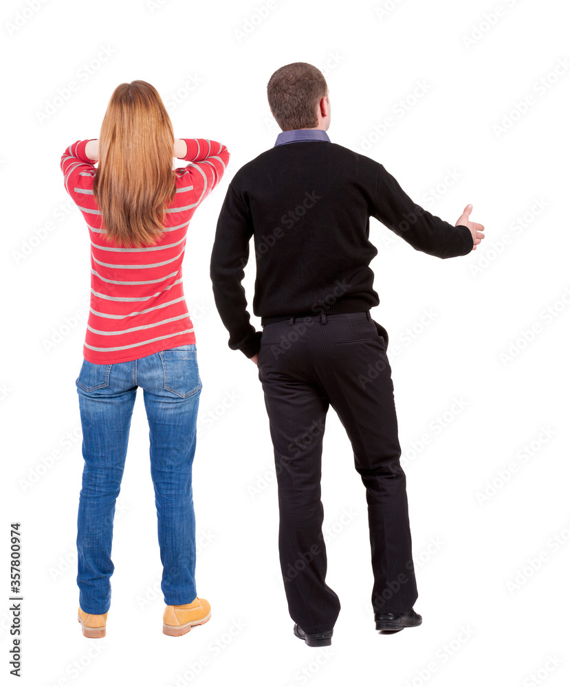 Back view couple in sweater. beautiful man and woman. Back view couple in sweater. beautiful man and woman.