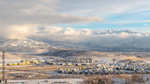 Panorama crop Mountain and residential neighborhood in Utah Valley on a snowy winter day