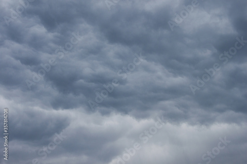 Stormy dark cloudy sky before rain texture background.