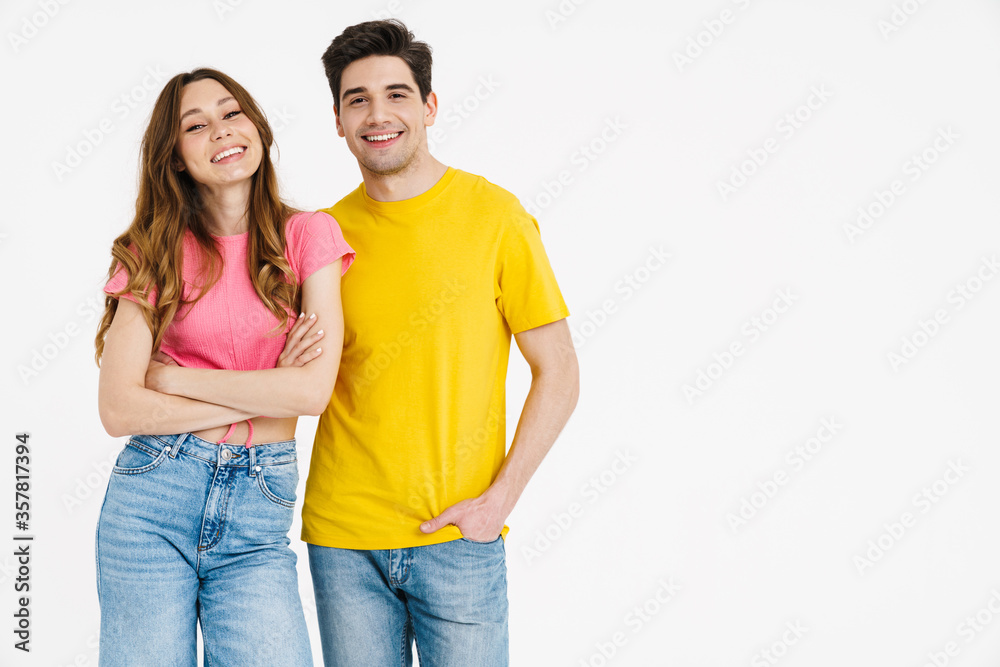 Image of joyful caucasian couple hugging and smiling at camera Image of joyful caucasian couple hugging and smiling at camera