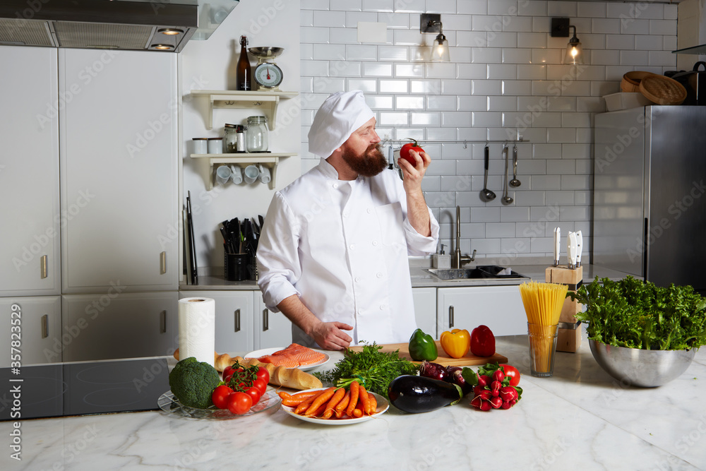 Professional cook cut vegetables in the kitchen Professional cook cut vegetables in the kitchen