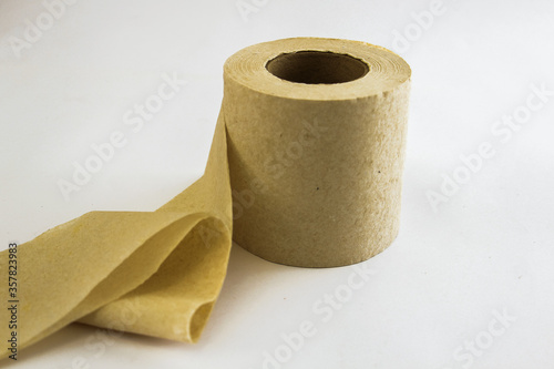 Recycled Toilet Paper. Brown Textured Tissue on a White Background.