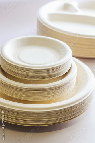Stack of Recycled Paper Plates. Biodegradable cutlery for Events And Parties.