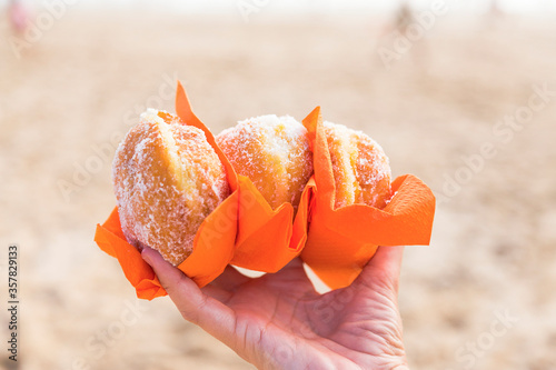 Tableau sur toile Berlin Balls: Portuguese fried dough covered in sugar, typical dessert