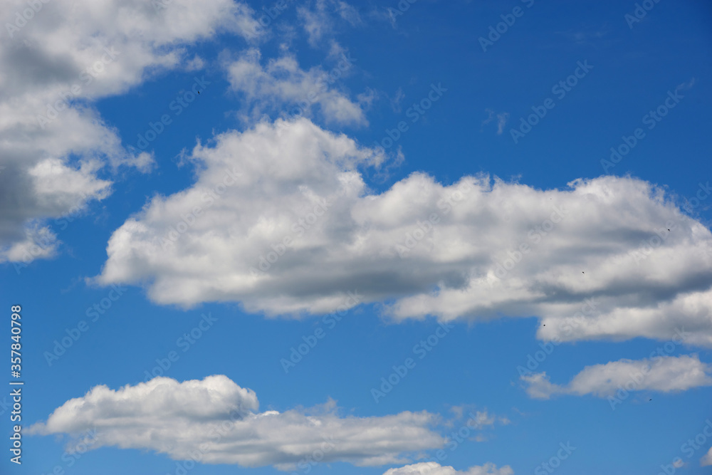 Air clouds in the blue sky. Nature background Air clouds in the blue sky. Nature background