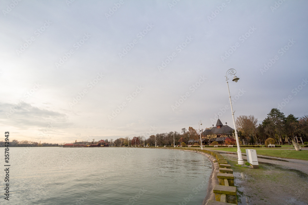 Panorama of Palic Lake, or Palicko Jezero, in Palic, Serbia, with the Velika Terasa, or Grand Terrace main building in the background. it is one of the main attractions of Vojvodina province