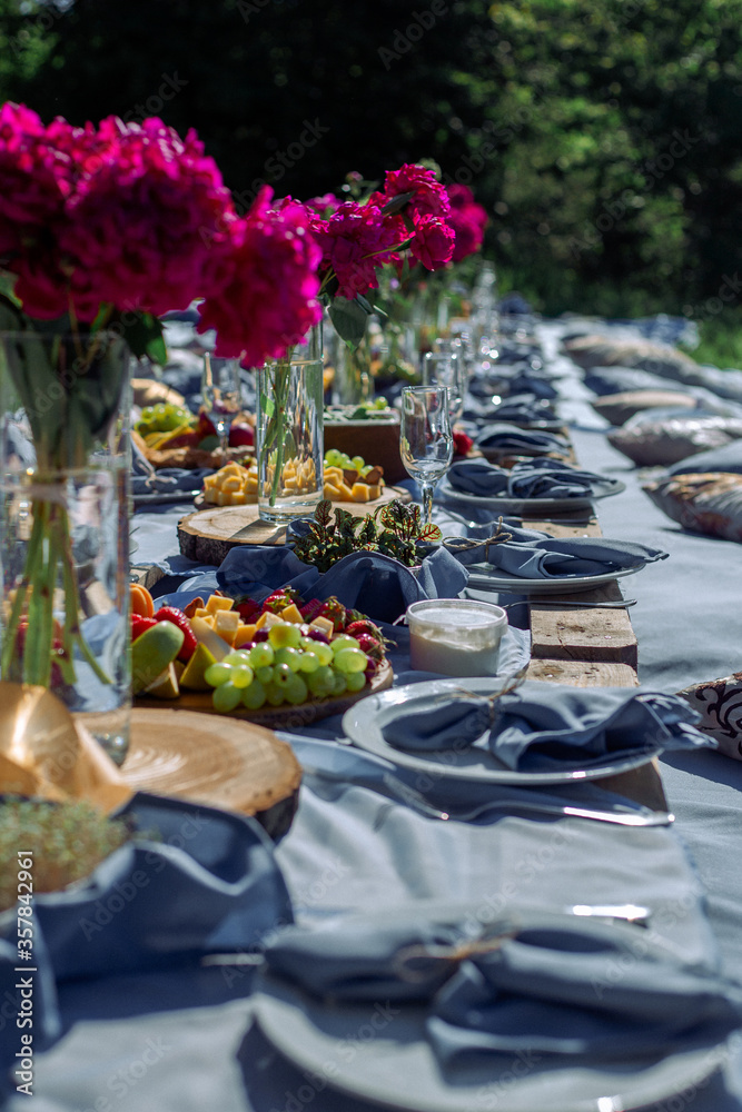 picnic table in blue tones for many guests
