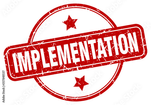 implementation grunge stamp. implementation round vintage stamp