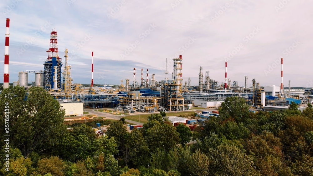 Aerial shot over a pipe infrastructure in an oil refinery in Gdansk, 