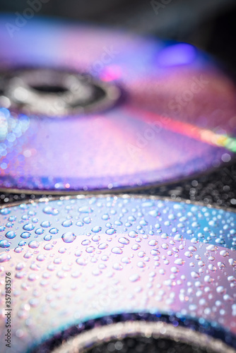 water drops on dvd media, water drops on colorful background