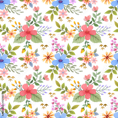 Colorful hand drawn flowers seamless pattern vector design. © teerawat