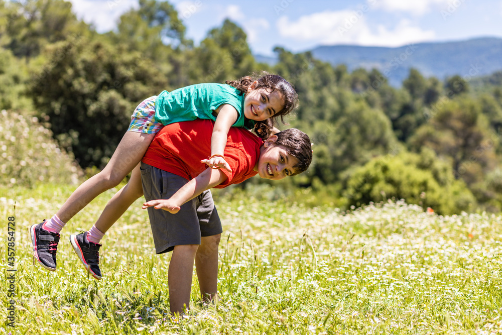 Fototapeta premium Kids having fun on a field