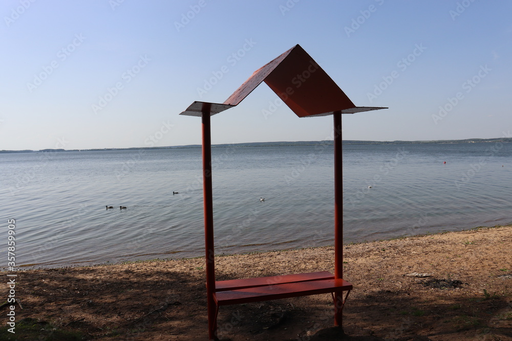 romantic bench at lake shore