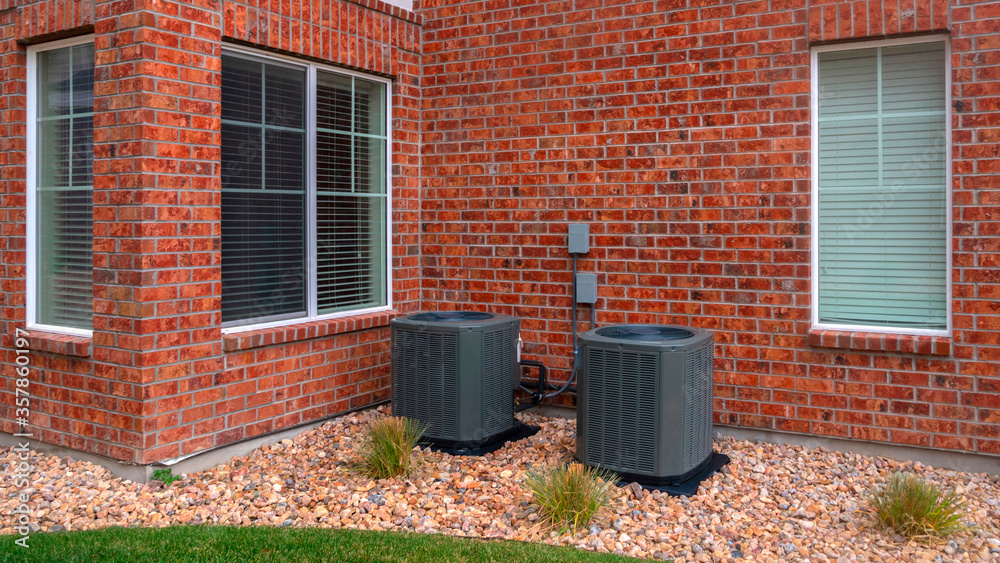 Naklejka premium Panorama frame Corner brick wall to a building with two bins
