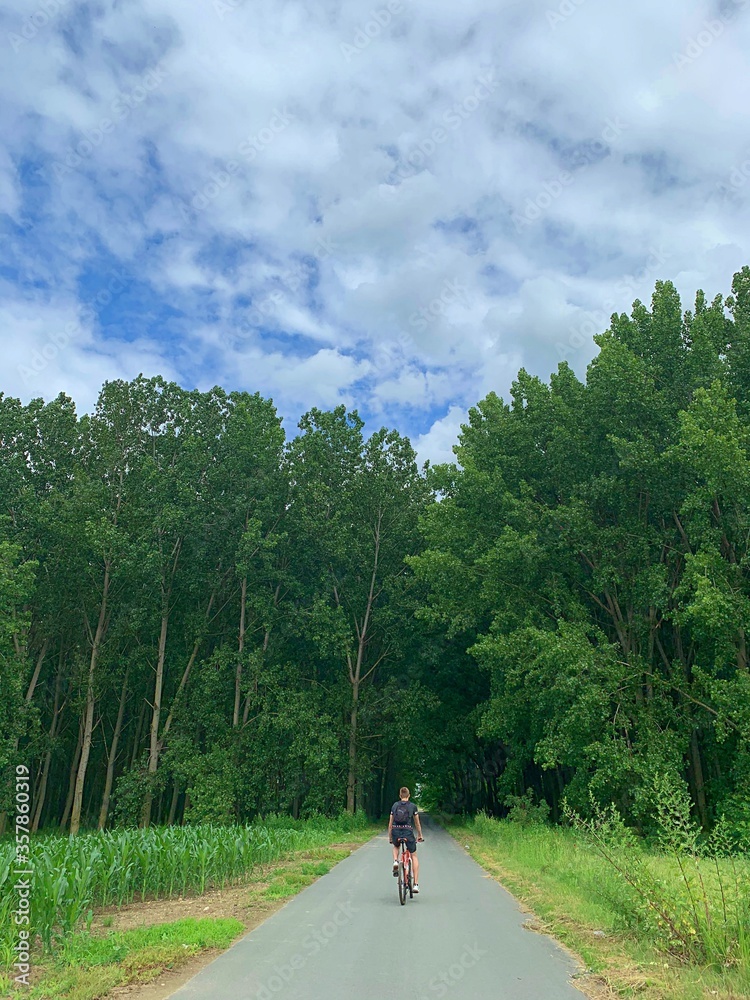 Man riding a bike.