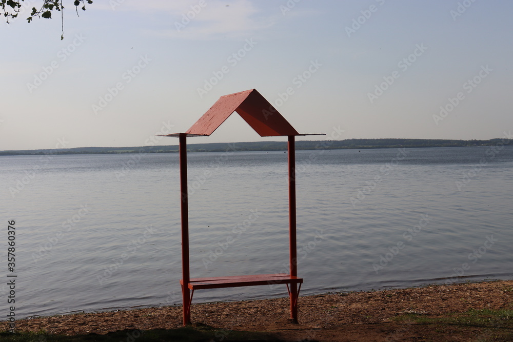 romantic bench at lake shore