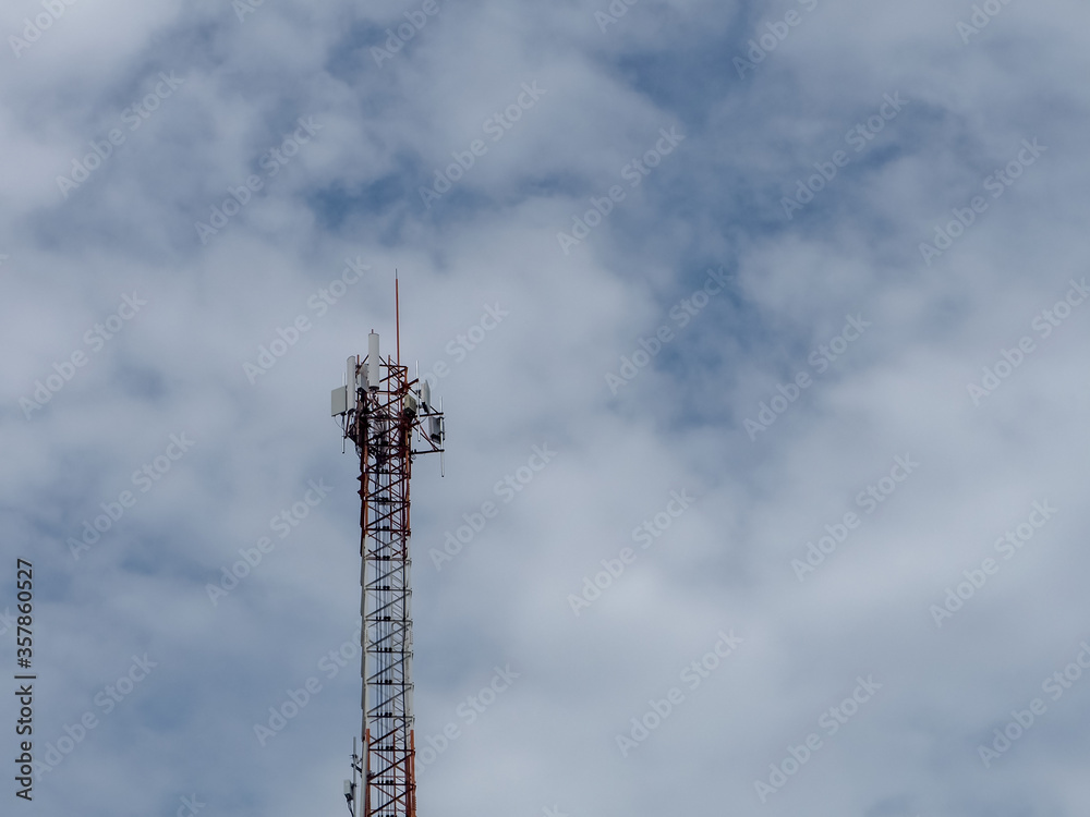 Telecommunication tower of 4G and 5G cellular. Cell Site Base Station. Wireless Communication Antenna Transmitter. Telecommunication tower with antennas against blue sky background. Telecommunication tower of 4G and 5G cellular. Cell Site Base Station. Wireless Communication Antenna Transmitter. Telecommunication tower with antennas against blue sky background.