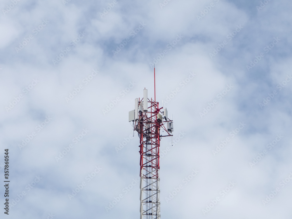Telecommunication tower of 4G and 5G cellular. Cell Site Base Station. Wireless Communication Antenna Transmitter. Telecommunication tower with antennas against blue sky background. Telecommunication tower of 4G and 5G cellular. Cell Site Base Station. Wireless Communication Antenna Transmitter. Telecommunication tower with antennas against blue sky background.