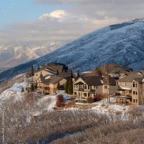 Square crop Homes on a mountain slope in Utah with breathtaking Wasatch Mountains view photo