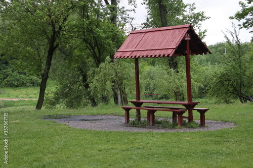 barbecue arbors in rainy park