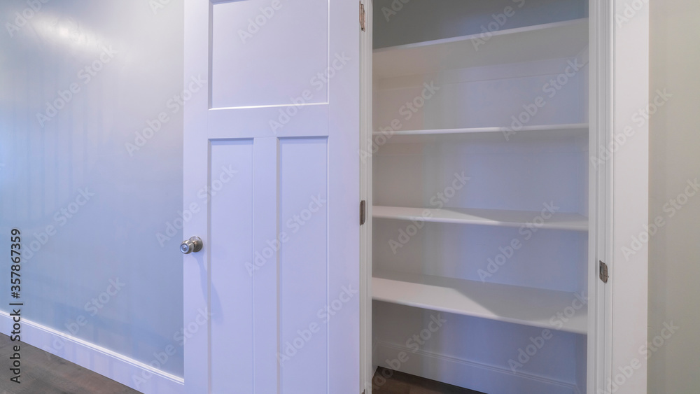 Panorama frame Open empty fitted cupboard or wardrobe interior Panorama frame Open empty fitted cupboard or wardrobe interior
