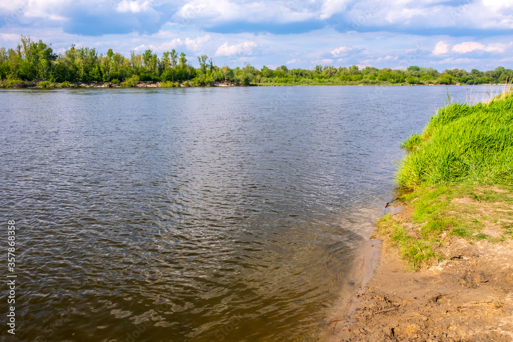 Panoramic view of Vistula river waters with sandy islands and shores of Lawice Kielpinskie natural reserve near Lomianki town north of Warsaw in central Mazovia region of Poland Panoramic view of Vistula river waters with sandy islands and shores of Lawice Kielpinskie natural reserve near Lomianki town north of Warsaw in central Mazovia region of Poland