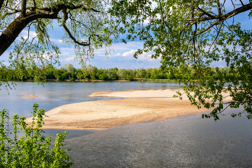 Panoramic view of Vistula river waters with sandy islands and shores of Lawice Kielpinskie natural reserve near Lomianki town north of Warsaw in central Mazovia region of Poland photo