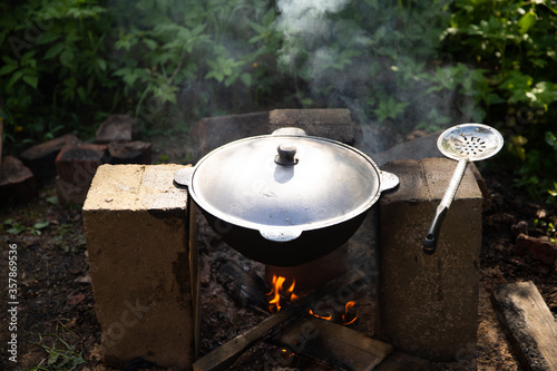 cooking pilaf in a cauldron