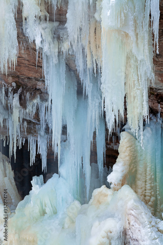 Winter landscape of frozen Upper Tahquamenon Falls, Tahquamenon Falls State Park, Michigan's Upper Peninsula, USA photo