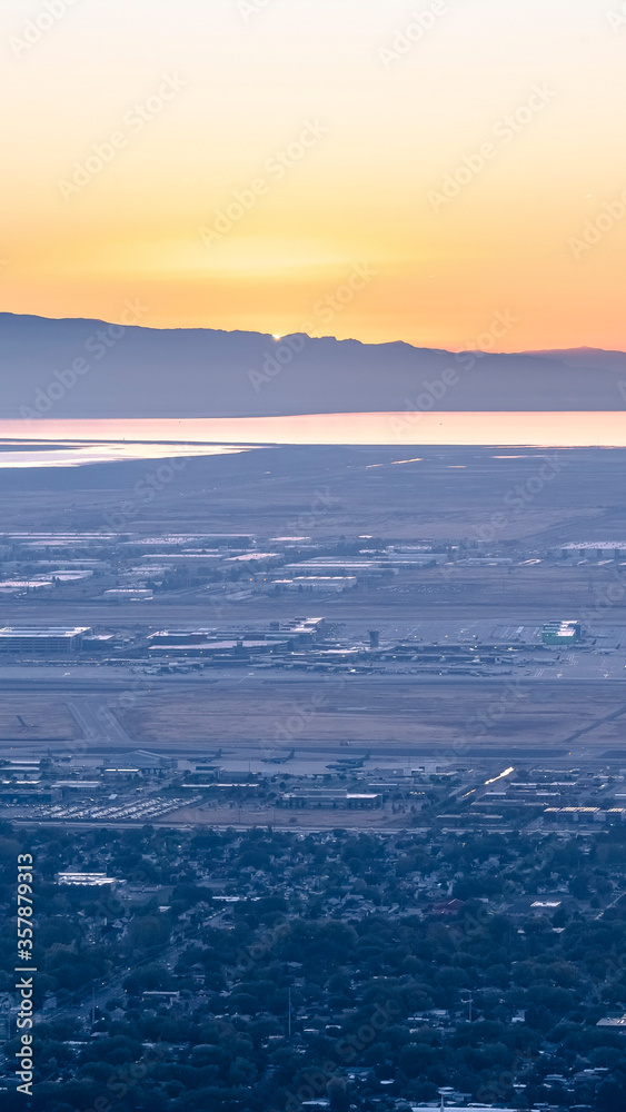 Vertical crop Sunrise over the Utah Valley and lake