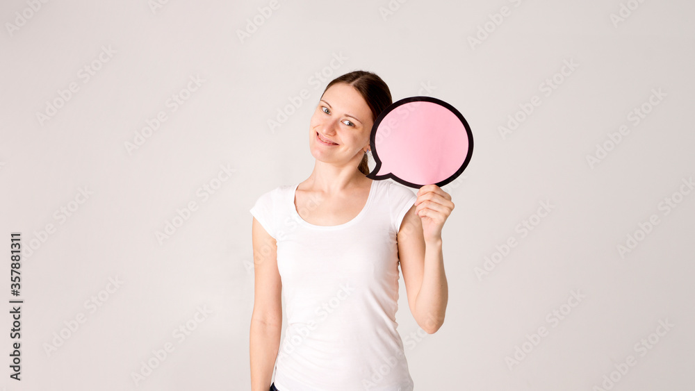 Woman shows sign speech bubbles. Speech bubble banner. Happy girl hold empty speech bubbles. Woman shows sign speech bubbles. Speech bubble banner. Happy girl hold empty speech bubbles.